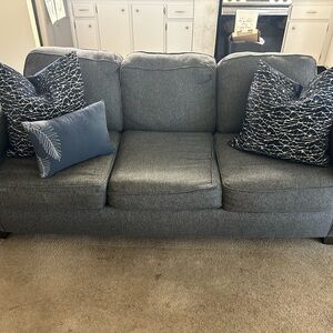 Elegant Gray Sofa with Blue Accent couch and pillows